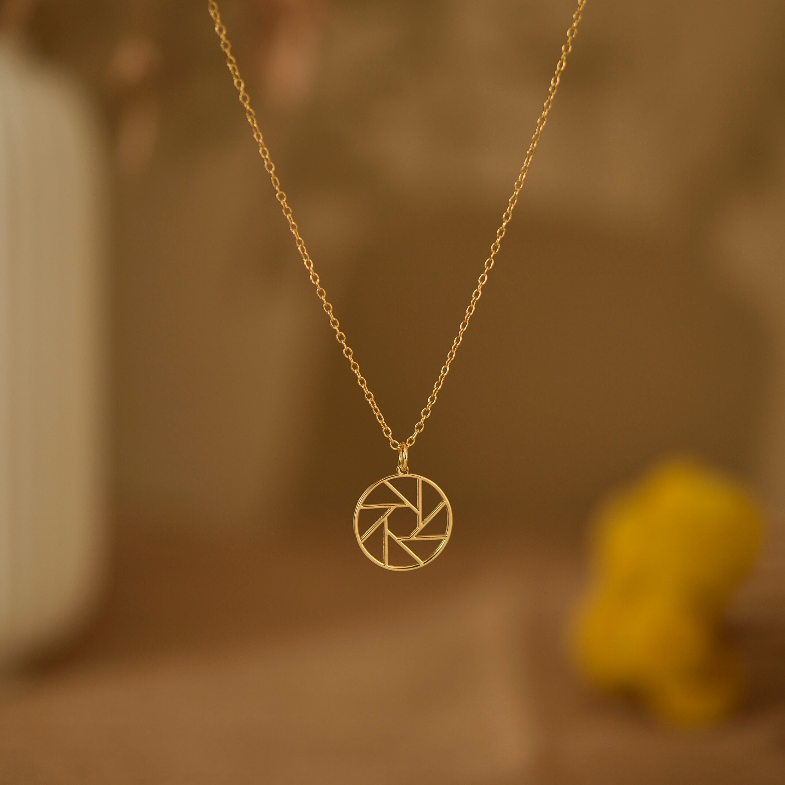 Camera Shutter Pendant-1 Camera shutter pendant 1