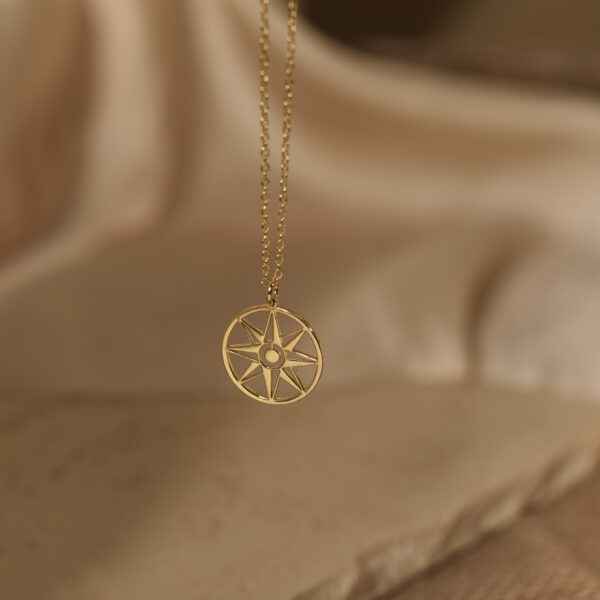 Gold compass necklace 2